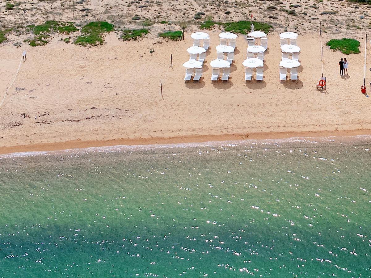 Hotel Pedra Santa Baja Sardinia Bagian luar foto