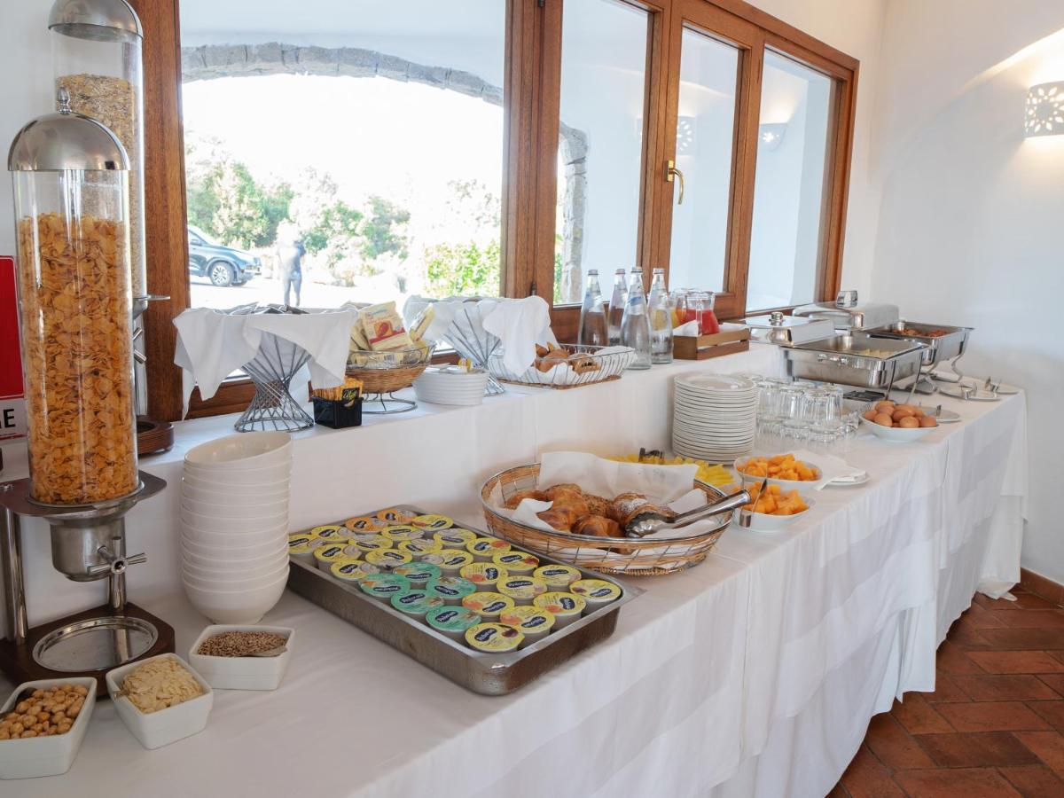 Hotel Pedra Santa Baja Sardinia Bagian luar foto