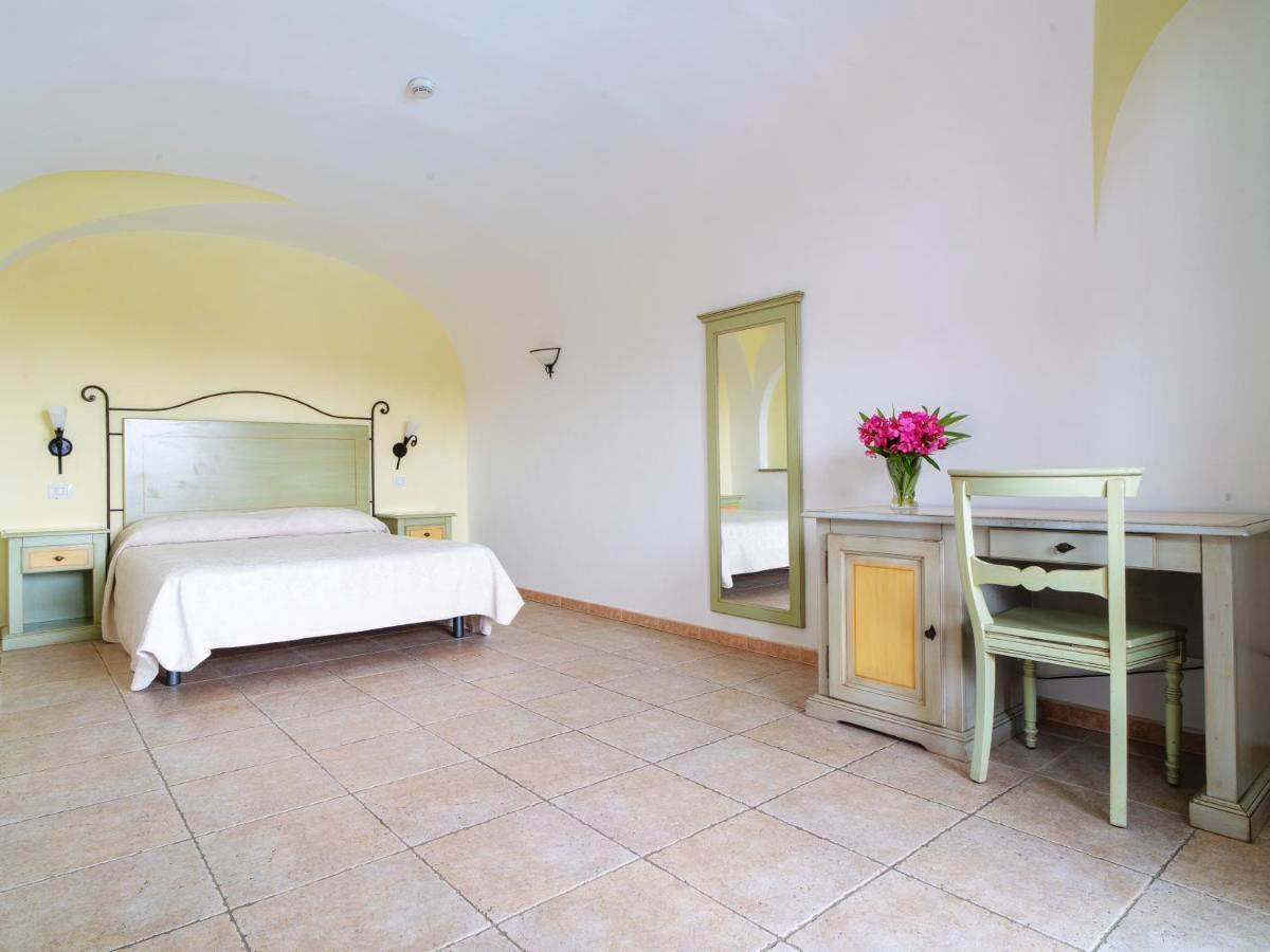 Hotel Pedra Santa Baja Sardinia Bagian luar foto