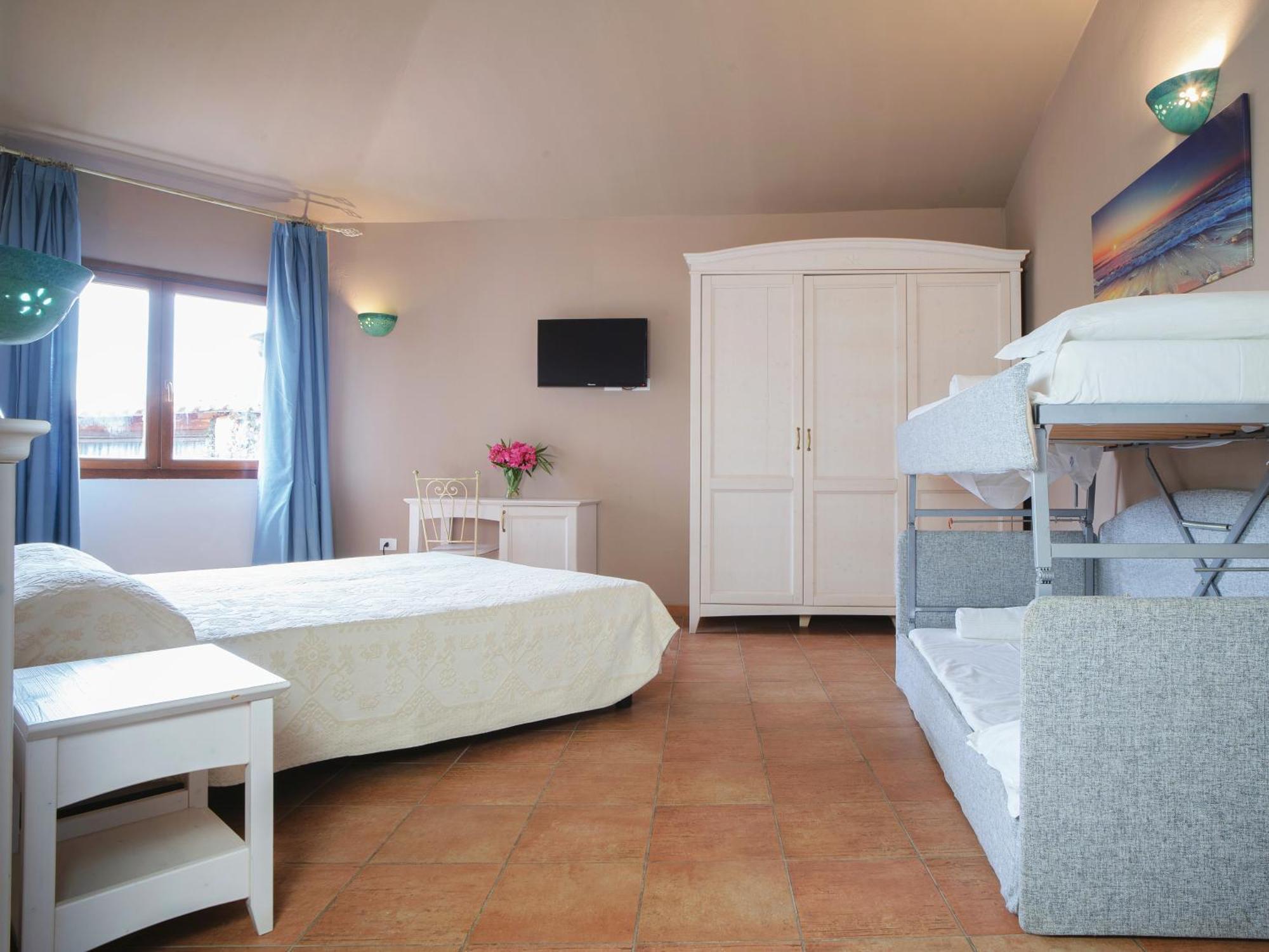 Hotel Pedra Santa Baja Sardinia Bagian luar foto